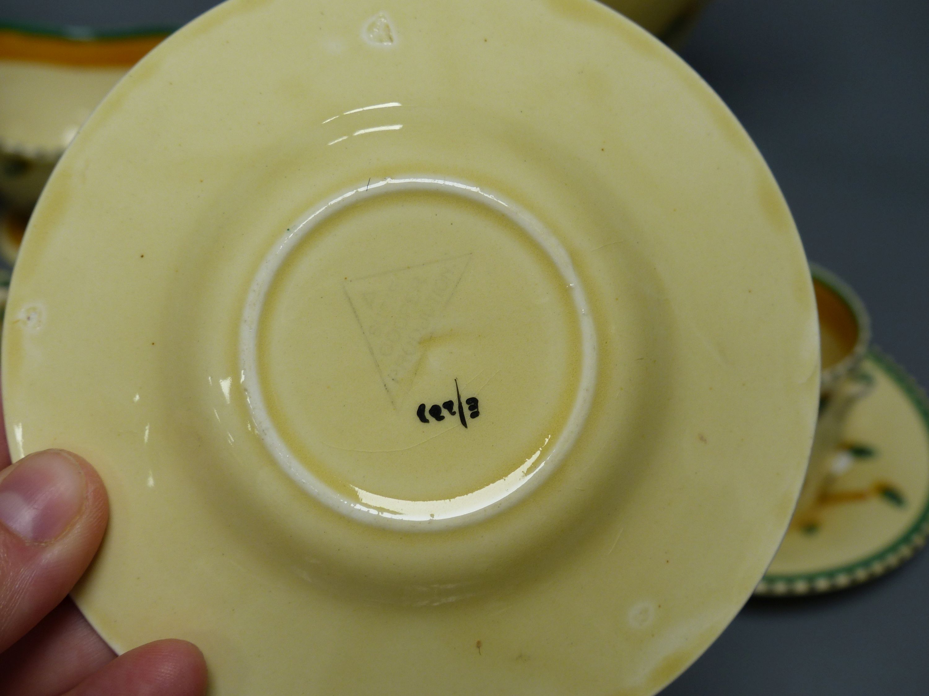 A rare 1930s Susie Cooper coffee set, pattern E283, triangular Susie Cooper Productions mark